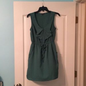 Dark green dress, size medium.
